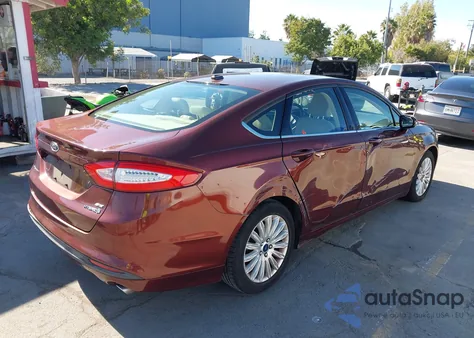 2015 Ford Fusion Hybrid Se z USA, uszkodzony, nr VIN 3FA6P0LU9FR229439